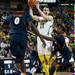 Michigan freshman Nik Stauskas passes during the first half of the game against Illinois on Sunday, Feb. 24. Daniel Brenner I AnnArbor.com
